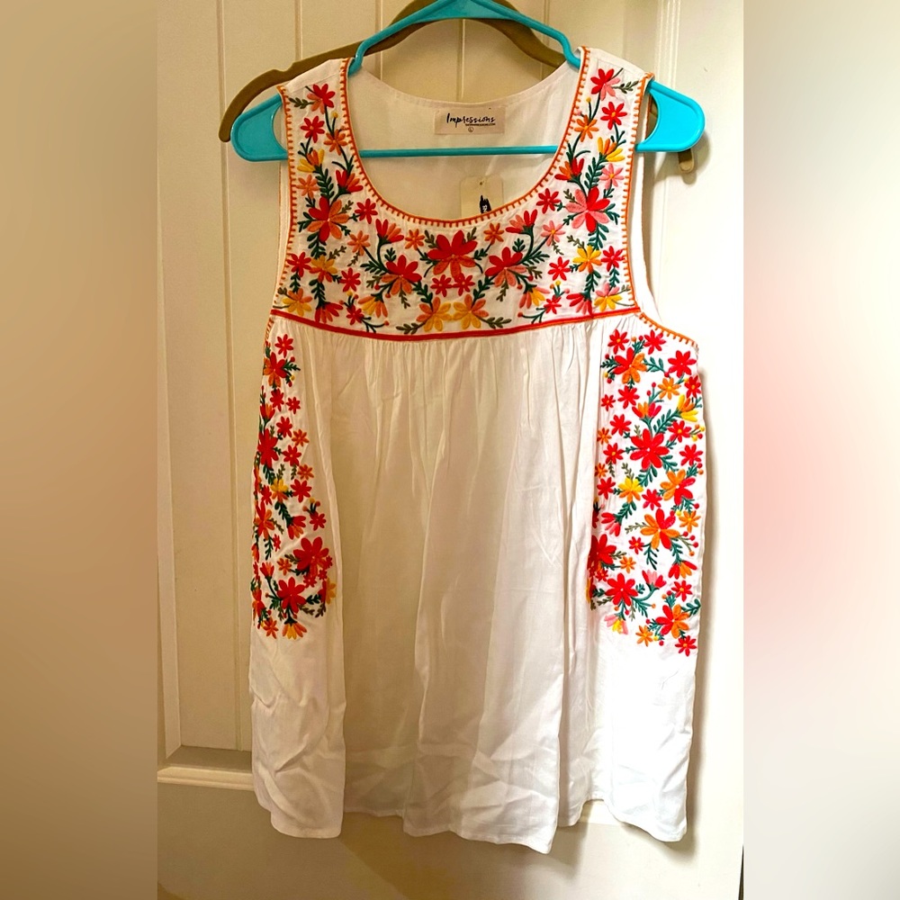 NWT boutique brand embroidered cream top